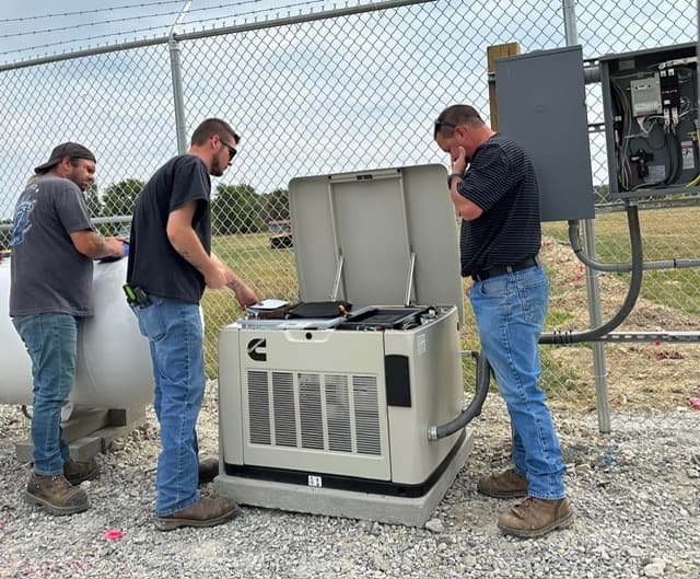 Commercial Cummins generator installed outside a building