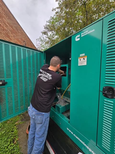 Commercial standby generator equipment installed on a concrete pad